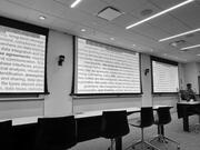 Projected slides for a science and technology presentation in a classroom.